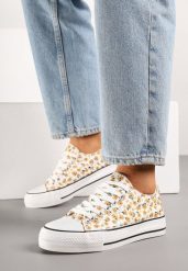 Żółte Trampki z Cholewką Zdobioną Kwiatowym Wzorem Folaianna. Żółte trampki damskie Born2be, z aplikacjami, z jeansu, bez zapięcia. Za 39.99 zł.