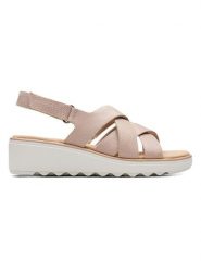 Clarks Skórzane sandały w kolorze jasnoróżowym na koturnie rozmiar: 39. Różowe sandały damskie Clarks, bez wzorów, ze skóry, z otwartym noskiem, bez obcasa, na koturnie, bez zapięcia. Za 125.27 zł.