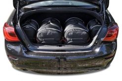 Torby Do Bagażnika Infiniti Q70 Hev 2013-2018 4Szt Kjust. Czarne torby podróżne KJUST, bez wzorów, z kauczuku. Za 1,140.00 zł.