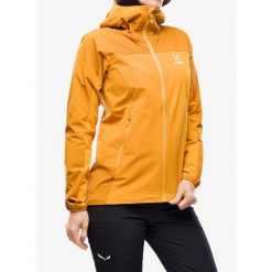 Kurtka softshell damska Haglofs Moran Softshell Hood. Żółte kurtki sportowe damskie Haglöfs, bez wzorów, z softshellu, bez kaptura. Za 596.99 zł.