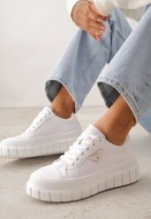 Białe Sneakersy VICES na Tłoczonej Podeszwie w Stylu Chunky Myninis. Białe obuwie sportowe damskie Renee, z koronki, bez zapięcia. Za 79.99 zł.