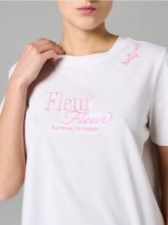 Bawełniana koszulka z haftowanym napisem - kremowy. Białe koszulki damskie Sinsay, l, bez wzorów, z bawełny, bez kołnierzyka, bez ramiączek. Za 19.99 zł.