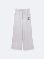 Spodnie damskie dresowe wide szare Madelinap 901. Szare spodnie dresowe damskie Big Star, l, z aplikacjami, z dresówki. Za 179.99 zł.