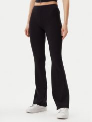 Guess Legginsy V5GB11 KCRS2 Czarny Regular Fit. Czarne legginsy damskie Guess, xs, z aplikacjami, z wiskozy. Za 199.99 zł.