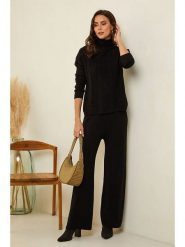 Soft Cashmere Spodnie w kolorze czarnym rozmiar: 38/40. Czarne spodnie materiałowe damskie Soft Cashmere, bez wzorów, z kaszmiru. Za 139.20 zł.