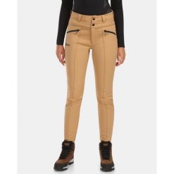Spodnie softshell damskie Kilpi MAURA-W. Brązowe spodnie sportowe damskie Kilpi, na zimę, bez wzorów, z softshellu, narciarskie. Za 680.25 zł.