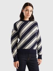 Benetton Wełniany sweter w kolorze granatowo-białym rozmiar: XL. Białe swetry klasyczne damskie Benetton, xl, z wełny, bez kołnierzyka. Za 172.49 zł.