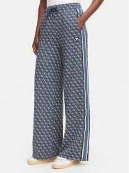Guess Spodnie dresowe V6YB27 K5181 Granatowy Relaxed Fit. Niebieskie spodnie dresowe damskie Guess, m, z aplikacjami, z dresówki. Za 426.99 zł.