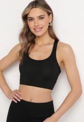 Czarny Biustonosz Top Sportowy z Elastycznego Materiału Revettia. Czarne koszulki sportowe damskie Born2be, m, bez wzorów, bez ramiączek. Za 29.99 zł.