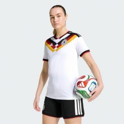 Koszulka podstawowa Germany 26 Women's Team. Białe koszulki damskie Adidas, l, bez wzorów, bez kołnierzyka, bez ramiączek. Za 439.00 zł.