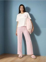 Bawełniana piżama dwuczęściowa z kieszenią - biały. Białe piżamy damskie Sinsay, bez wzorów, z bawełny, bez ramiączek. Za 59.99 zł.