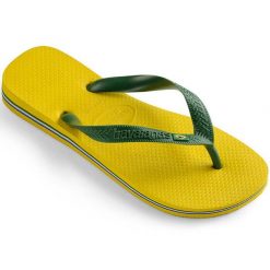 Japonki damskie Havaianas Brasil Citrus Yellow 4000032-2197. Żółte klapki damskie Havaianas, bez wzorów, z materiału, bez obcasa, bez zapięcia. Za 89.00 zł.