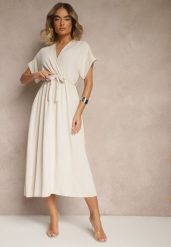 Jasnobeżowa Rozkloszowana Sukienka z Gumką w Talii i Wiązaniem Sepenira. Brązowe sukienki damskie Renee, bez wzorów, z jeansu, eleganckie, bez ramiączek. W wyprzedaży za 63.99 zł.