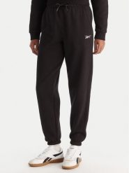 Reebok Spodnie dresowe Reebok X Ewa Chodakowska Evren RK25308CCW Czarny Regular Fit. Czarne spodnie dresowe damskie Reebok, l, bez wzorów, z dresówki. Za 179.99 zł.