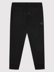 Guess Spodnie dresowe L2YQ46 KAIJ1 Czarny Regular Fit. Czarne spodnie dresowe chłopięce Guess, z bawełny. Za 139.99 zł.