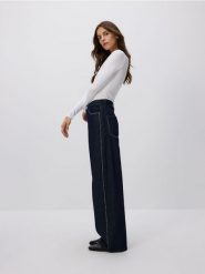 Jeansy wide leg z aplikacjami - granatowy. Niebieskie jeansy damskie Reserved. Za 159.99 zł.