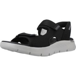 Sandały Skechers Model Slip-ins Go Walk Flex Kolor Czarny. Czarne sandały damskie Skechers, bez wzorów, z tkaniny, bez obcasa, bez zapięcia. Za 279.99 zł.