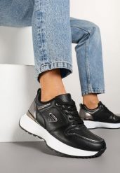 Czarne Sneakersy Ozdobione Perforacją i Geometryczną Aplikacją Senilanea. Czarne obuwie sportowe damskie Renee, z jeansu, bez zapięcia. Za 99.99 zł.