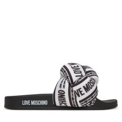 Klapki LOVE MOSCHINO. Białe klapki damskie Love Moschino, bez wzorów, bez obcasa, bez zapięcia. Za 689.99 zł.