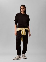 Calvin Klein Bluza w kolorze czarnym rozmiar: M. Czarne bluzy damskie Calvin Klein, m, bez wzorów, bez kaptura. Za 221.95 zł.