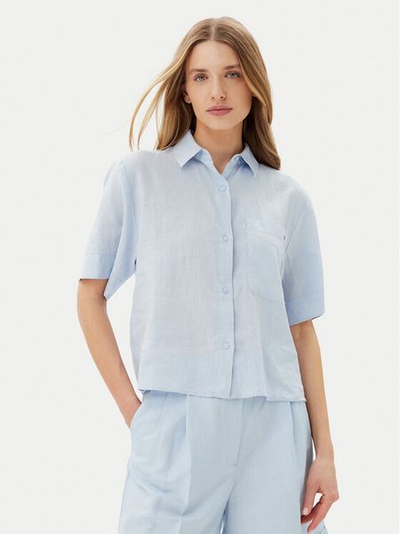 Tommy Hilfiger Koszula WW0WW44720 Błękitny Relaxed Fit. Niebieskie koszule damskie Tommy Hilfiger, bez wzorów, ze lnu, bez kołnierzyka, bez ramiączek. Za 279.99 zł.