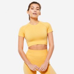 Koszulka fitness damska Domyos krótki rękaw. Czarne koszulki damskie DOMYOS, l, bez wzorów, z materiału, bez kołnierzyka, bez ramiączek. W wyprzedaży za 59.99 zł.