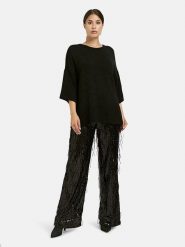 Milano Italy Spodnie w kolorze czarnym z cekinami rozmiar: 34. Czarne spodnie materiałowe damskie Milano Italy, bez wzorów, z materiału. Za 252.99 zł.