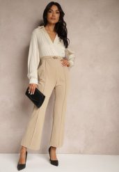 Beżowy Kopertowy Kombinezon z Elegancką Koszulową Górą i Szerokimi Nogawkami Vareti. Brązowe sukienki damskie Renee, bez wzorów, biznesowe, bez ramiączek. W wyprzedaży za 111.99 zł.