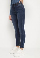 Granatowe Jeansy Slim z Gumką w Talii i Sznurkiem z Bawełną Ilisora. Niebieskie jeansy damskie Born2be, bez wzorów, z bawełny. Za 24.99 zł.