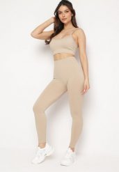 Beżowy Komplet Sportowy Biustonosz na Ramiączkach i Legginsy z Gumką w Pasie Nadlira. Brązowe legginsy damskie Born2be, m, bez wzorów. Za 79.99 zł.