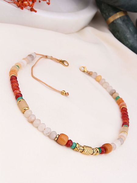 Charlize Pozłacany naszyjnik z kamieniami ozdobnymi i agatami - dł. 45 cm rozmiar: onesize. Czerwone naszyjniki damskie Charlize, z agatem, pozłacane. Za 82.83 zł.