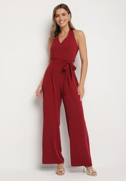 Bordowy Taliowany Kombinezon z Paskiem Wiązaniem i Odkrytymi Plecami Malurea. Czerwone sukienki damskie Born2be, bez wzorów, z jeansu, eleganckie, bez ramiączek. Za 119.99 zł.