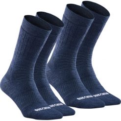 Skarpety turystyczne Quechua SH100 ciepłe mid 2 pary. Niebieskie skarpetki damskie QUECHUA, bez wzorów, z elastanu. W wyprzedaży za 29.99 zł.