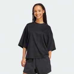 Luźna koszulka Soft Lux. Brązowe bluzki damskie Adidas, xl, bez wzorów, bez kołnierzyka, bez ramiączek. Za 199.00 zł.