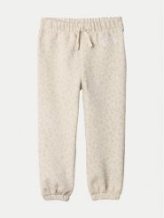 Gap Spodnie dresowe 635490 Écru Regular Fit. Spodnie dresowe dziewczęce GAP, bez wzorów, z bawełny. Za 69.99 zł.