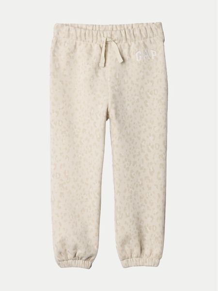 Gap Spodnie dresowe 635490 Écru Regular Fit. Spodnie dresowe dziewczęce GAP, bez wzorów, z bawełny. Za 99.99 zł.