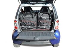 Torby Do Bagażnika Smart Fortwo Coupe 1998-2007 2Szt Kjust. Czarne torby podróżne KJUST, bez wzorów, z kauczuku. Za 503.00 zł.