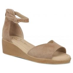 Skórzane sandały damskie na koturnie taupe Filippo DS7635. Sandały damskie Filippo, bez wzorów, ze skóry, bez obcasa, na koturnie, bez zapięcia. Za 179.99 zł.