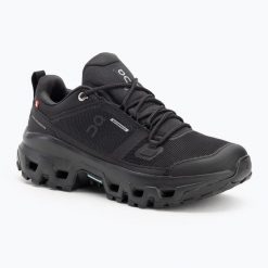 Buty damskie On Cloudrock Low Waterproof. Czarne obuwie trekkingowe damskie On, z materiału, bez zapięcia. Za 801.45 zł.