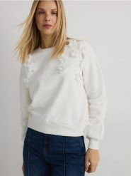 Bawełniana bluza z aplikacją - kremowy. Białe bluzy damskie Reserved, l, z aplikacjami, z bawełny, bez kaptura. W wyprzedaży za 69.99 zł.