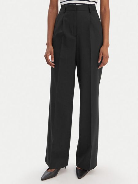 Tommy Hilfiger Spodnie materiałowe Timeless WW0WW48801 Czarny Wide Leg. Czarne spodnie materiałowe damskie Tommy Hilfiger, bez wzorów, z materiału. Za 699.99 zł.