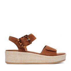 Sandały Remonte. Brązowe sandały damskie Remonte, bez wzorów, bez obcasa, na koturnie, bez zapięcia. Za 379.99 zł.