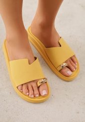 Żółte Klapki Japonki Ozdobione Aplikacją na Palcu Noevianna. Żółte klapki damskie Renee, z aplikacjami, z jeansu, bez obcasa, na płaskiej podeszwie, bez zapięcia. Za 79.99 zł.