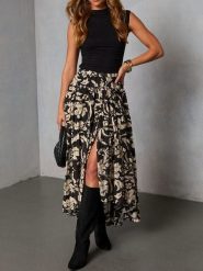 Milan Kiss Spódnica w kolorze czarno-kremowym rozmiar: L. Czarne spódnice damskie Milan Kiss, l, bez wzorów, z wiskozy, midi. Za 165.99 zł.