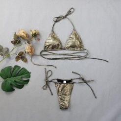 Bikini z wzorem zwierzęcym odporne na chlor i słoną wodę Lenke. Żółte bikini Intica, bez wzorów, z materiału. Za 139.00 zł.