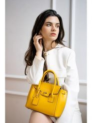 Victor & Hugo Paris Skórzana torebka "Jeny" w kolorze żółtym - 25 x 19 x 7 cm rozmiar: onesize. Żółte torebki klasyczne damskie Victor & Hugo Paris, z materiału, przez ramię, bez dodatków. Za 347.99 zł.