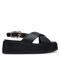 Sandały LOVE MOSCHINO. Czarne sandały damskie Love Moschino, bez wzorów, bez obcasa, na koturnie, bez zapięcia. Za 919.99 zł.