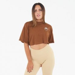Koszulka crop top damska COSMIC LOVE brązowa. Brązowe bluzki damskie LEGEA, bez wzorów, z bawełny, sportowe, bez kołnierzyka, bez ramiączek. Za 52.00 zł.