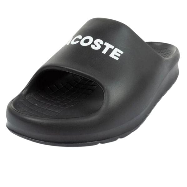 Klapki Damskie Serve. Czarne klapki damskie Lacoste, bez wzorów, z gumy, z otwartym noskiem, bez obcasa, na obcasie, bez zapięcia. Za 169.00 zł.