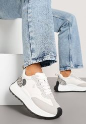 Białe Sneakersy Vices na Grubej Podeszwie z Motywem Panterki i Naszywką Selarisa. Białe obuwie sportowe damskie Born2be, z jeansu, bez zapięcia. Za 99.99 zł.